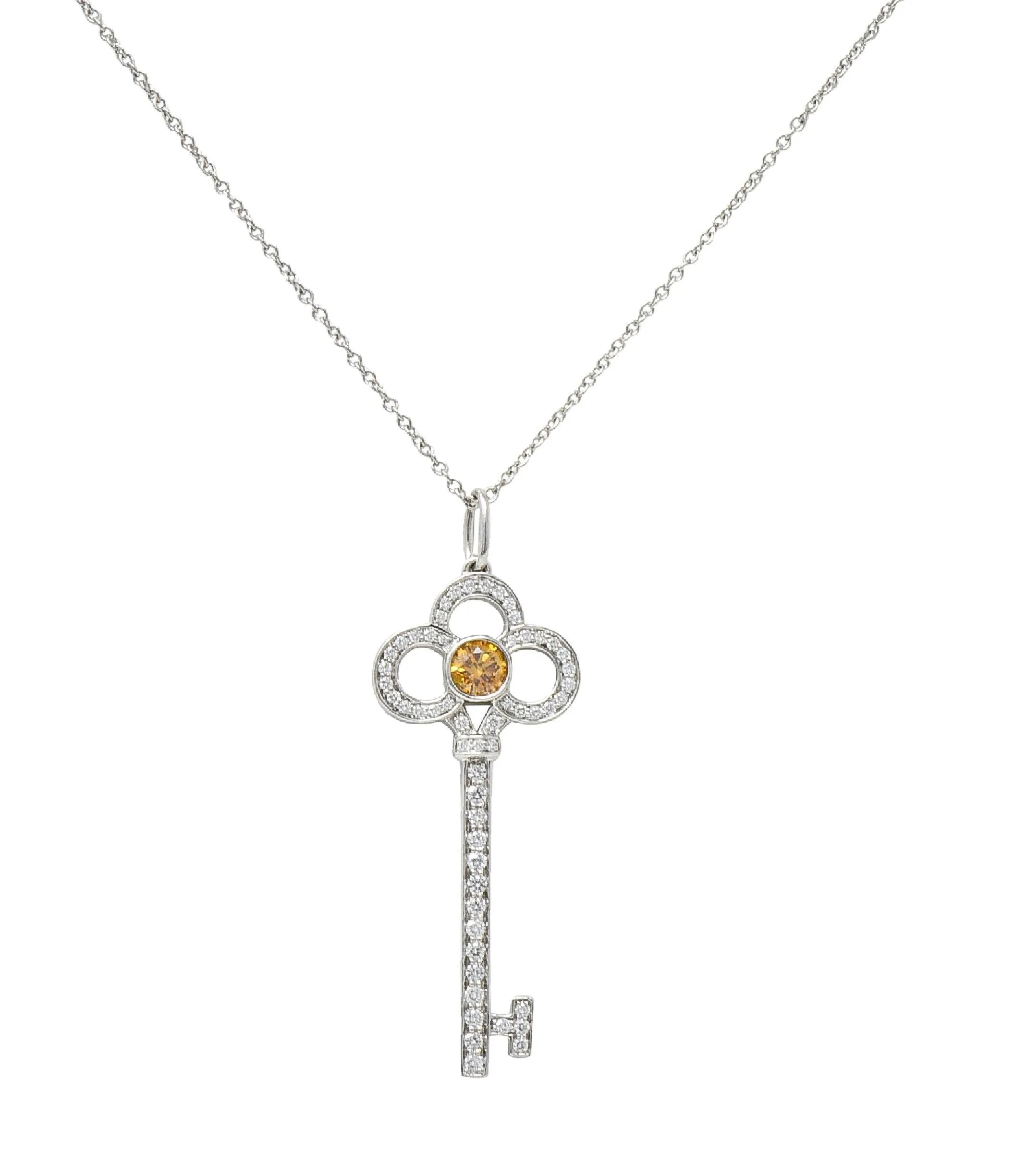 Tiffany & Co. Contemporary Fancy Diamond Platinum Crown Key Pendant Neccklace